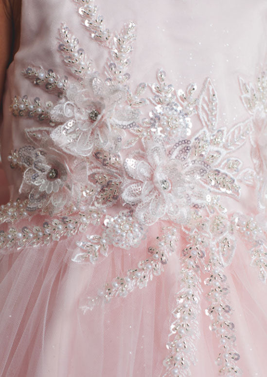girls pink special occasion dress with 3D floral appliqués and intricate beading