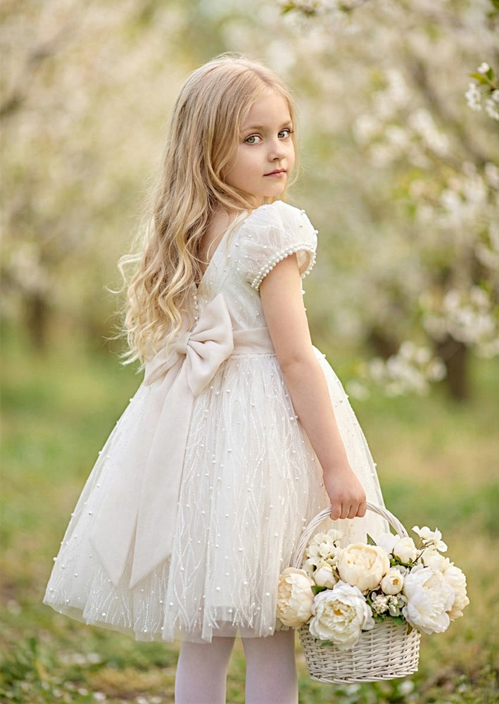 Girls Party Dress in White | Beaded Bodice & Bow Back