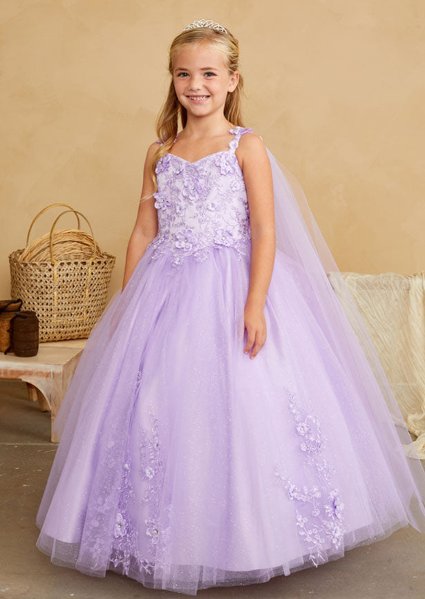 Inspired by fairy tale elegance, this enchanting lavender gown showcases a meticulously crafted lace bodice adorned with dimensional floral embellishments