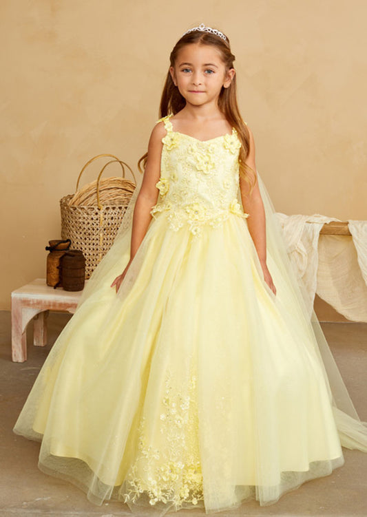 Inspired by fairy tale elegance, this enchanting yellow gown showcases a meticulously crafted lace bodice adorned with dimensional floral embellishments