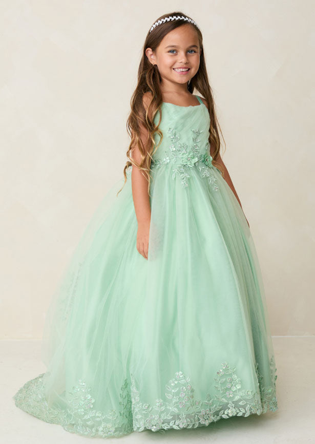 Crafted for the discerning eye, this floor-length girls sage green gown showcases a beautifully pleated bodice embellished with dimensional floral lace and shimmering iridescent accents