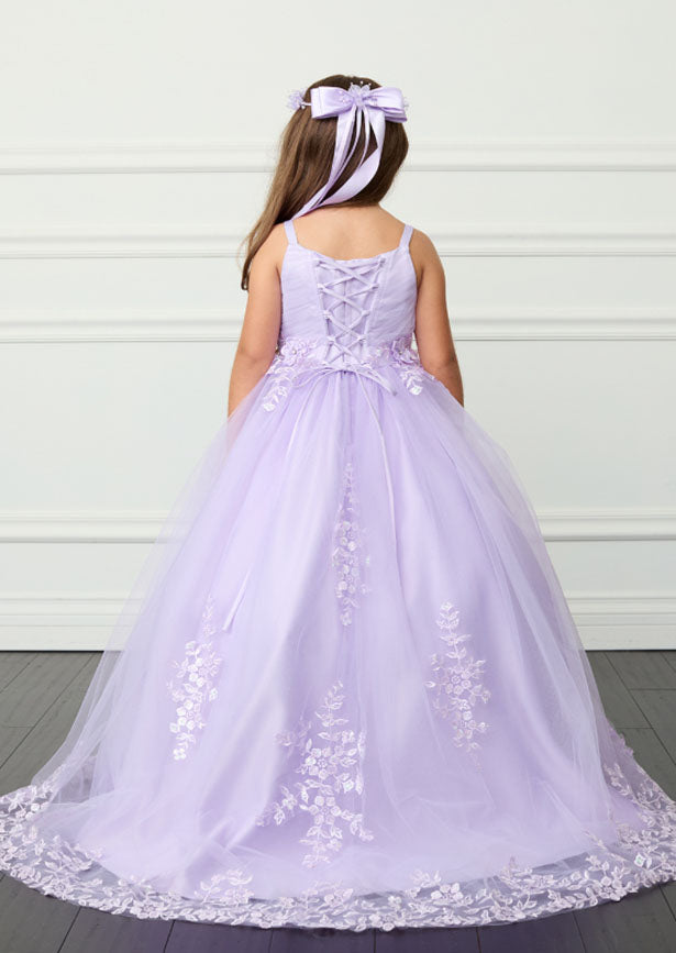 The Isla Gown in lavender presents an elegant silhouette with floor-length proportions and an extended train