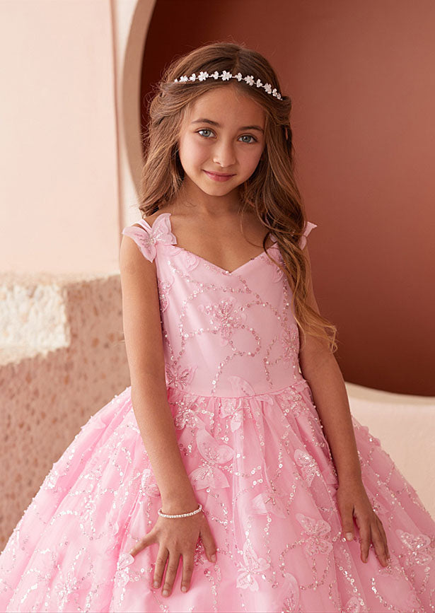 Pia Butterfly Gown in Pink—an enchanting full-length dress designed for the discerning young wearer