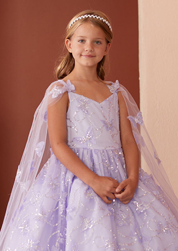This elegant lavender gown for young girls showcases spaghetti straps and a beautifully detailed bodice adorned with luminous 3D sequin butterflies and  cape