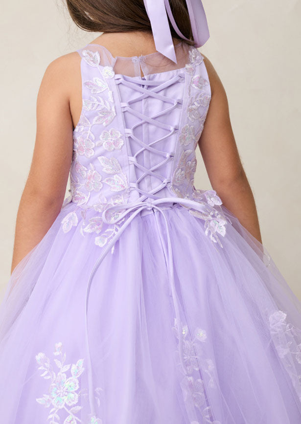 Elegant lavender gown featuring an enchanting illusion neckline adorned with iridescent lace appliqués that cascade down the bodice and waist. Intricate 3D floral lace detailing
