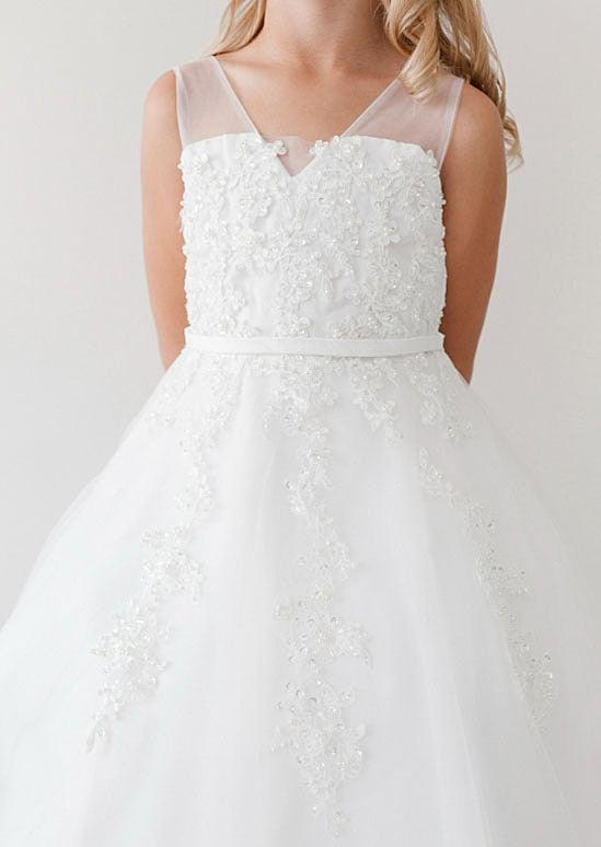  Mya Dress is designed for your daughter's most memorable moments. This stunning gown features a graceful V-neckline bodice adorned with delicate lace, shimmering sequins, and pearl embellishments. 