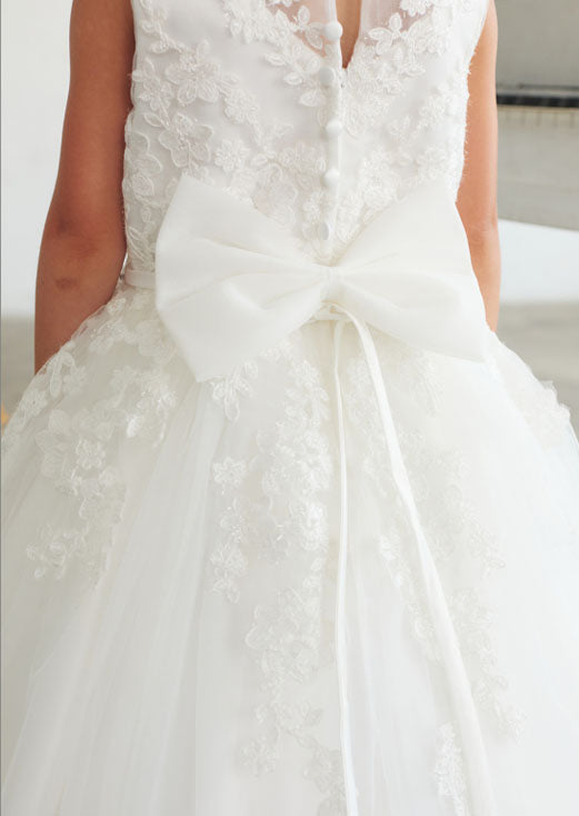 Elegant and enchanting, the Olivia Girls Dress features a shimmering lace bodice adorned with a rhinestone-embellished neckline.