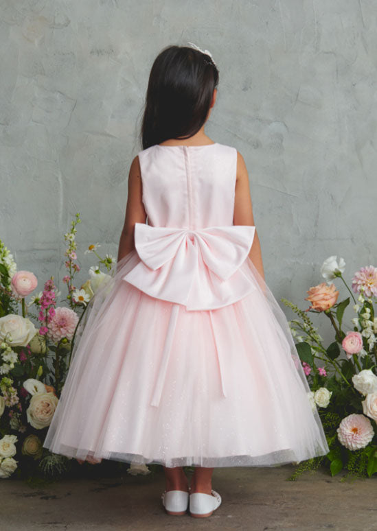 girls pink special occasion dress with 3D floral appliqués and intricate beading